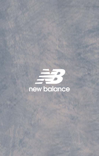New Balance logo on a textured background