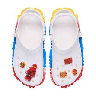 Red ninja-themed Jibbitz charms set on white clogs, five pieces