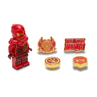 Red ninja minifigure and four matching fire-themed Jibbitz charms on white background