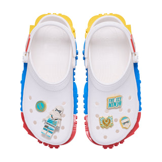 White Crocs with blue/red sides and Zane Jibbitz charms, including ice ninja logo