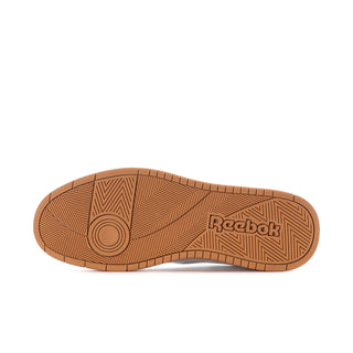 Men's sneaker outsole view in gum brown with Reebok logo and traction pattern