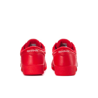 Women’s red Reebok low-top sneaker heels with rear logo patch