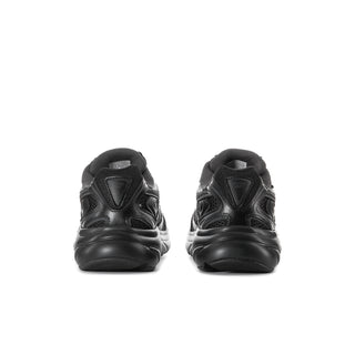Men's black athletic sneakers from back, padded heel tabs and sculpted side overlays