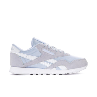 Women's low-top lace-up sneakers in light blue and white, with paneling and logo