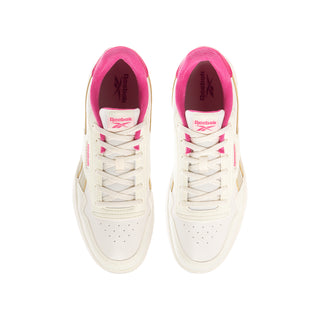 Youth white Reebok sneaker with pink lining and lace-up front, top view