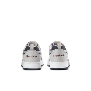 Youth lace-up sneakers, white heel and navy panels with Reebok logo on back