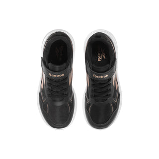 Kids black running shoes with laces and Reebok logo on the tongue
