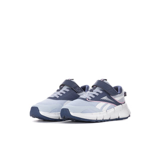 Kids light blue athletic sneakers with navy heel tab and white laces