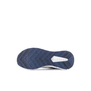 Kids sneaker outsole with navy tread and white cushioning center