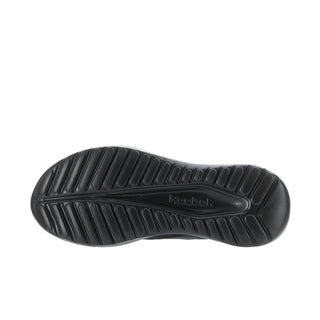 Black outsole tread of women's lace-up running sneakers with deep rubber grooves