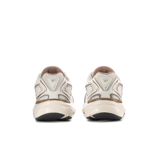 Women’s off-white sneakers shown from back, cushioned heel with dark outsole