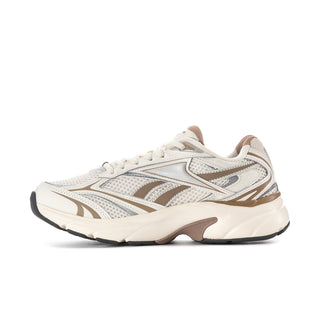 Women’s off-white running sneakers, side profile with gray panels and dark sole