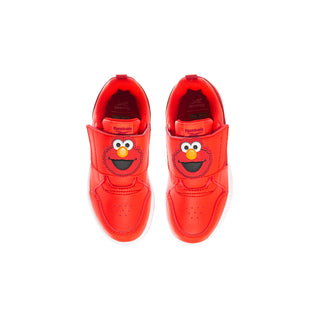 Red toddler sneakers with Sesame Street Cookie Monster face on each tongue