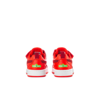 Red toddler sneakers with Sesame Street heel label and white rubber sole