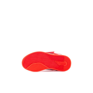 Red toddler sneaker outsole with textured tread and Reebok logo
