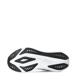 Women's running shoe outsole, black rubber tread on white platform midsole