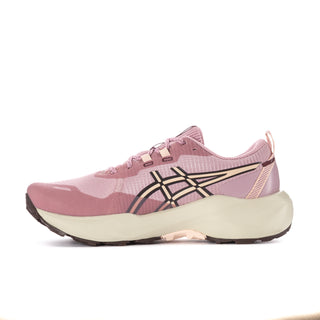Women’s pink low-top running sneaker side view with black logo and cream midsole