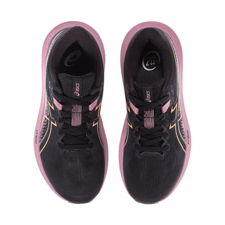 Women’s running shoes with black mesh upper, pink lining, gold side graphics