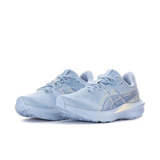 Women's ASICS running shoes, light blue upper with gold logo, side view
