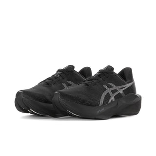 Women's black running shoes with ASICS logo, lace-up mesh upper and thick sole.