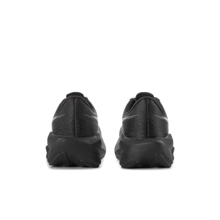 Women's black running shoes, rear view with padded heel and chunky rocker sole.