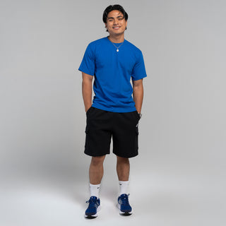 Men's royal blue crew neck T-shirt on model, short sleeves