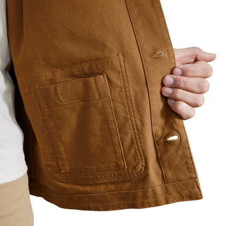 Brown denim jacket hem with flap pocket and side button