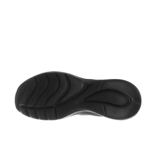 Black sneaker outsole with textured tread pattern and wave ridges