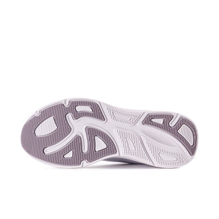 Women's slip-on sneakers outsole view, textured tread on light lilac and white