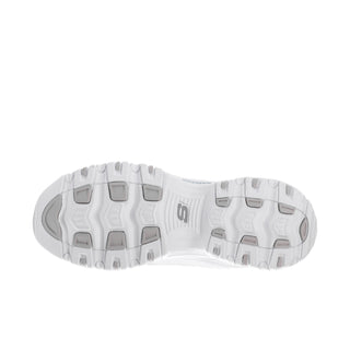 White sneaker outsole with textured tread and S logo on the midfoot