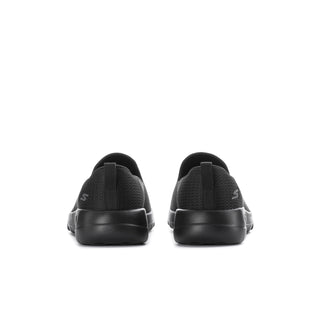 Black slip-on walking shoes with heel tabs and cushioned collar, rear view