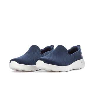 Women's navy slip-on sneaker, side view, textured upper and white outsole