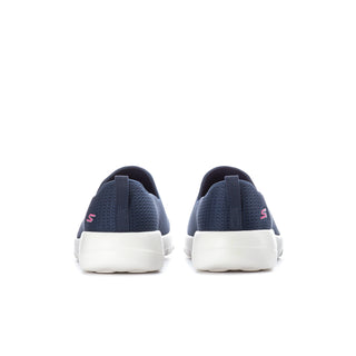 Women's navy slip-on sneaker, rear view with pull tab and white sole