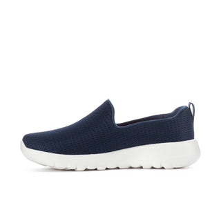 Women's navy slip-on sneaker, front side view with white sole