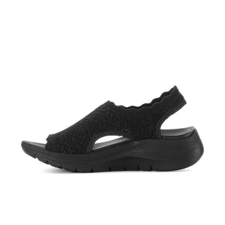 Women's Arch Fit 2.0 black sandal, side profile with knit straps and rocker sole