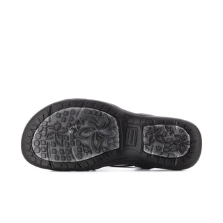 Black women's sandal outsole with textured traction pattern