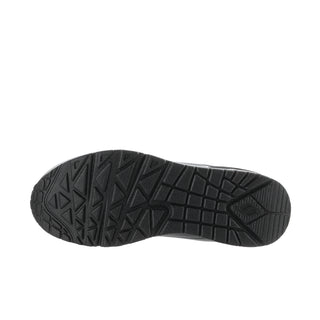 Black Skechers sneaker outsole tread with grid and arrow pattern