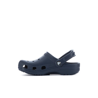 Kids navy clog side view with ventilation holes and logo badge on strap