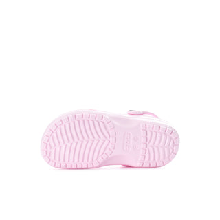 Kids' pink clog outsole view with textured tread and sidewall channels