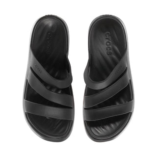 Black slide sandal close-up with two wide straps and embossed footbed.