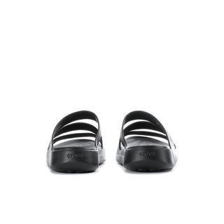 Black slide sandal heel view with two wide straps and textured sole base.