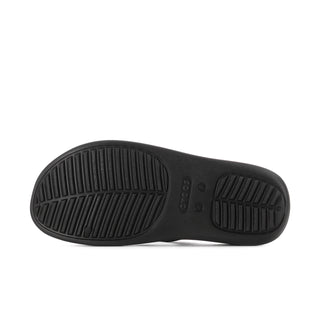 Black rubber outsole with tread pattern and embossed branding details.