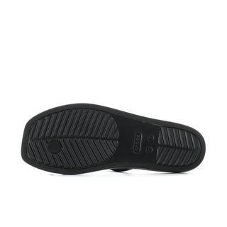 Black sandal outsole with tread pattern and toe-loop strap attachment.