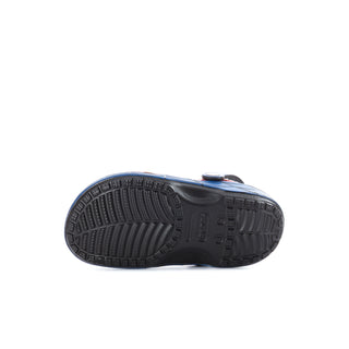 Kids clog outsole in dark rubber with traction tread underside view