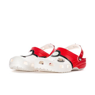 Pair of men's red-and-white clogs with black accents and adjustable heel strap