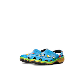 Toddler clog with blue upper, cartoon character print, and yellow-green outsole