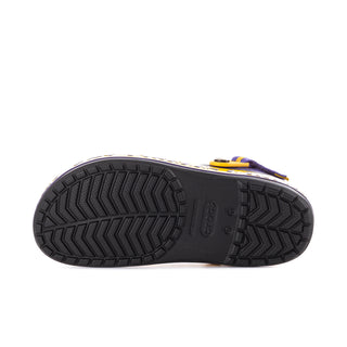 Outsole view of men's purple Crocband clog with textured tread for grip.