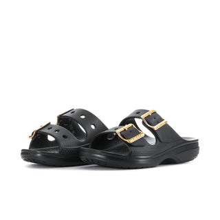 Women's black slide sandals with two gold buckles and perforated upper