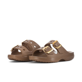 Women's sepia slide sandal with perforated upper and two gold buckles, side angle.