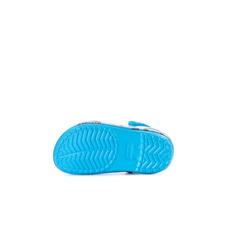 Toddler blue clog outsole tread, underside view with traction pattern